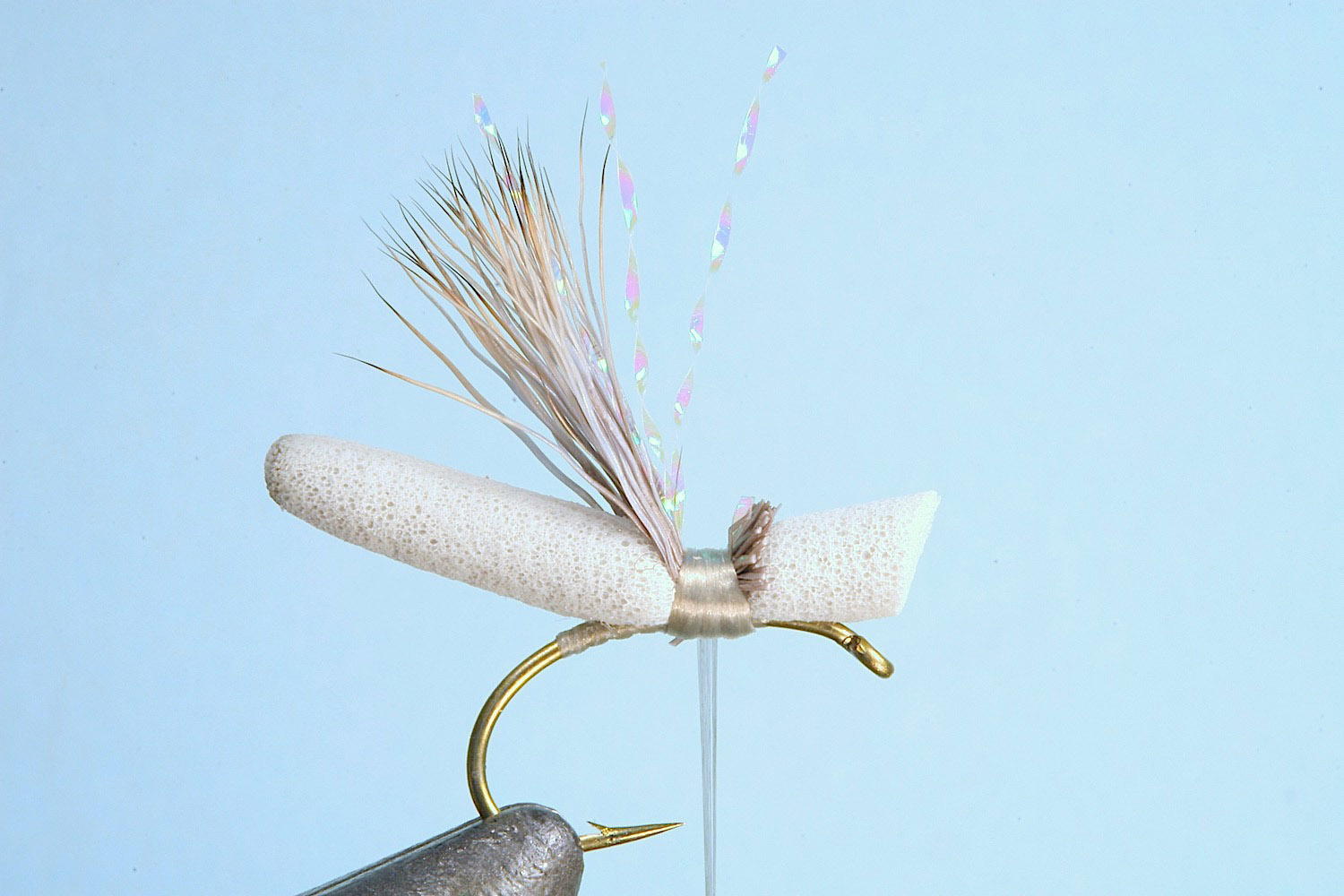 Showing step 4 of tying sequence for hot foam hopper fly pattern