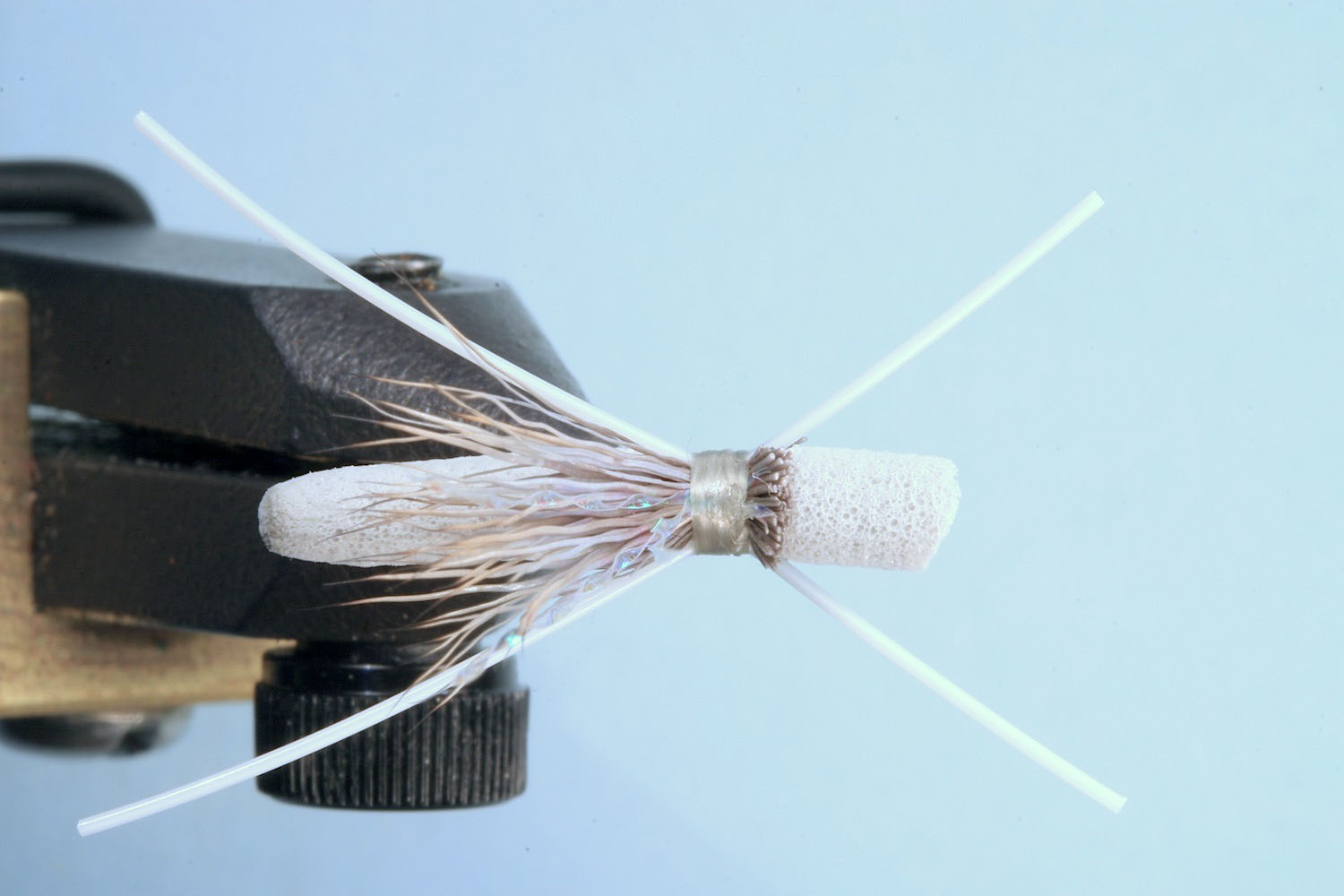 Showing step 5 of tying sequence for hot foam hopper fly pattern