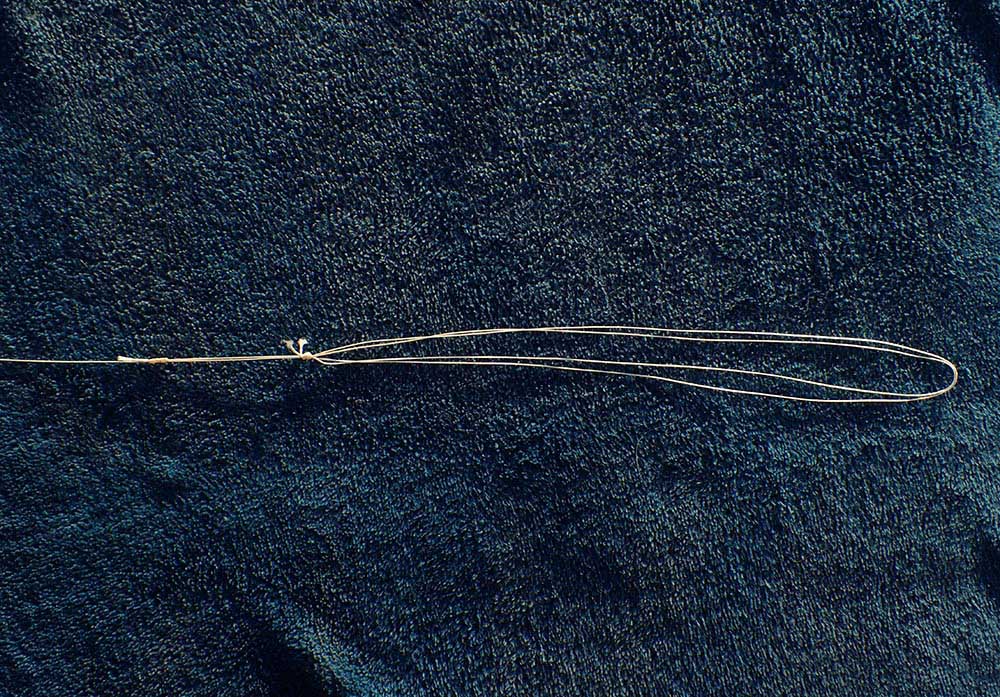 Twin loop connection line on black background